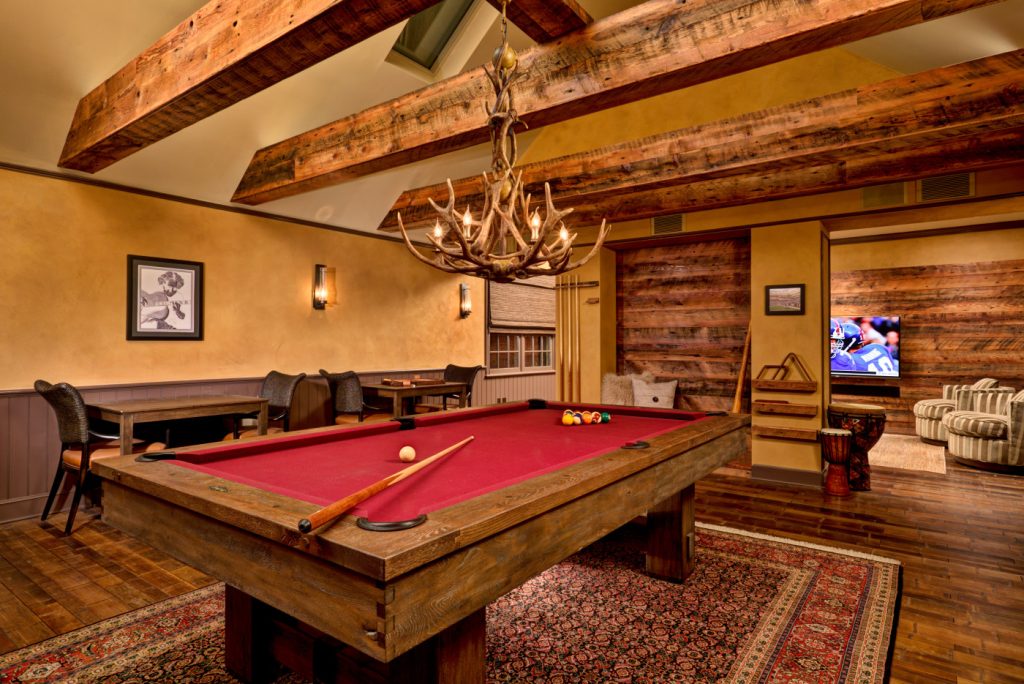 Home Game Rooms: Saratoga Springs general contractor Teakwood Builders used a built-in cubby to give adults and kids a space to enjoy.
